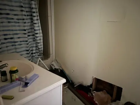 a bathroom with a sink and a vanity