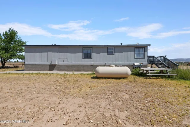 a view of wooden floor with a lake