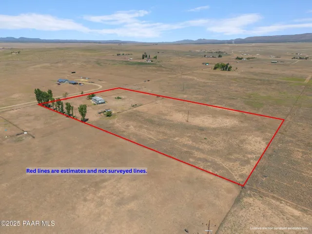 an aerial view of beach and ocean