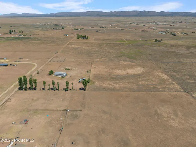 an aerial view of beach and ocean