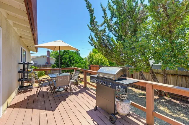 a view of balcony with furniture