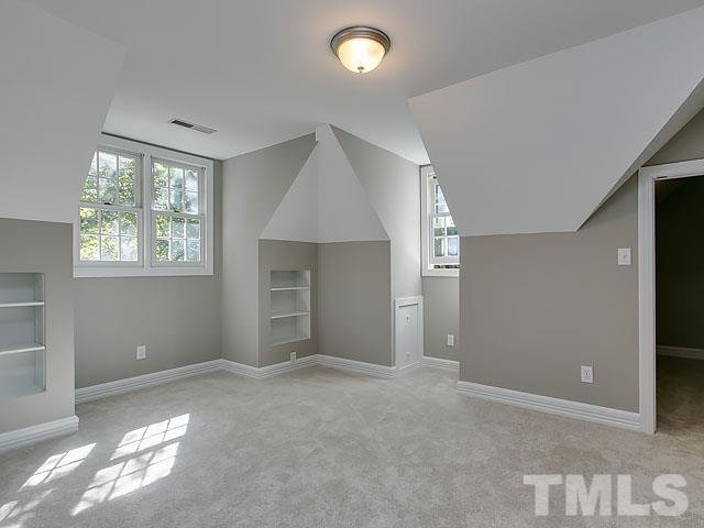401 Mumm Lane Raleigh, NC 27615 - Photo 15 of 25 a view of an empty room with a window