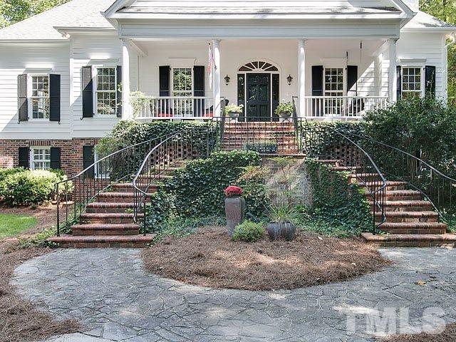 401 Mumm Lane Raleigh, NC 27615 - Photo 2 of 25 a front view of a house with a yard