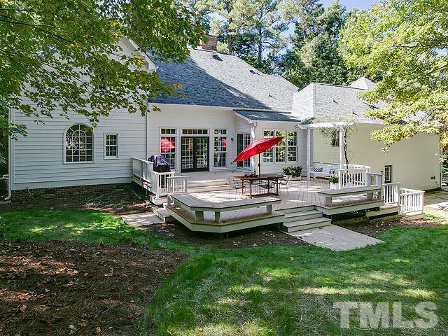 401 Mumm Lane Raleigh, NC 27615 - Photo 23 of 25 a view of a house with backyard and porch