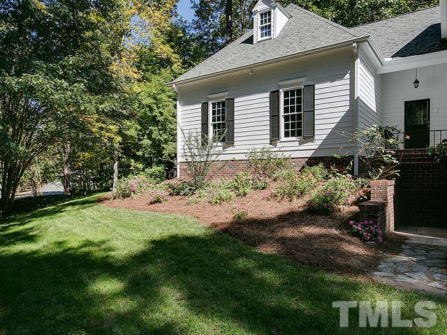 401 Mumm Lane Raleigh, NC 27615 - Photo 25 of 25 a front view of a house with a yard