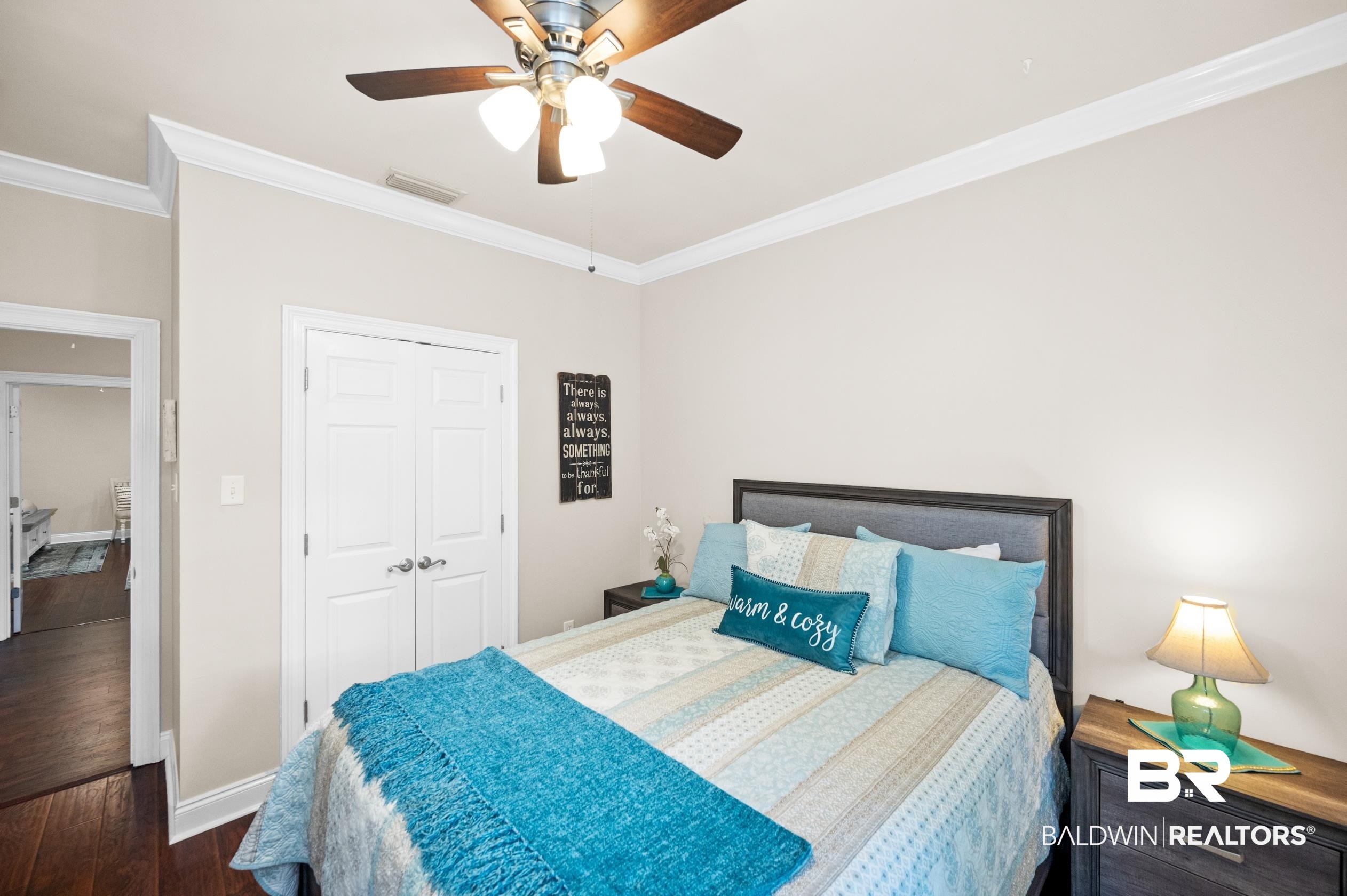 29614 St George Street Daphne, AL 36526 - Photo 31 of 42 Bedroom featuring ceiling fan, crown molding, hardwood / wood-style flooring, and a closet