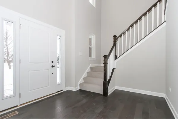 a view of entryway with stairs