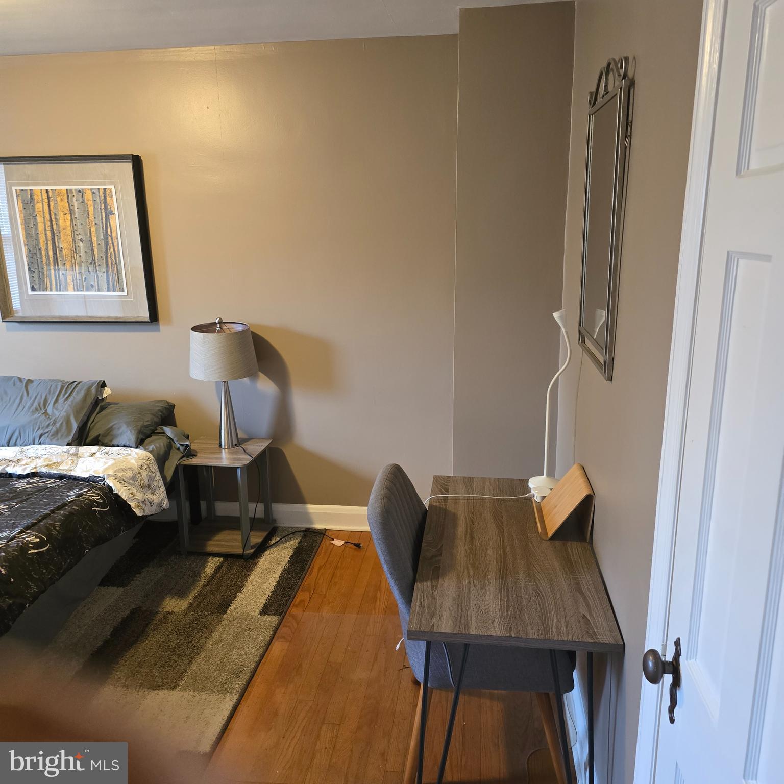 1508 Kennewick Road Baltimore, MD 21218 - Photo 13 of 15 a bed room with a bed furniture and a window