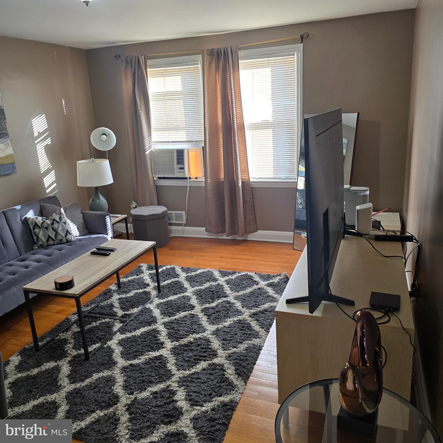 1508 Kennewick Road Baltimore, MD 21218 - Photo 10 of 15 a living room with furniture and a window