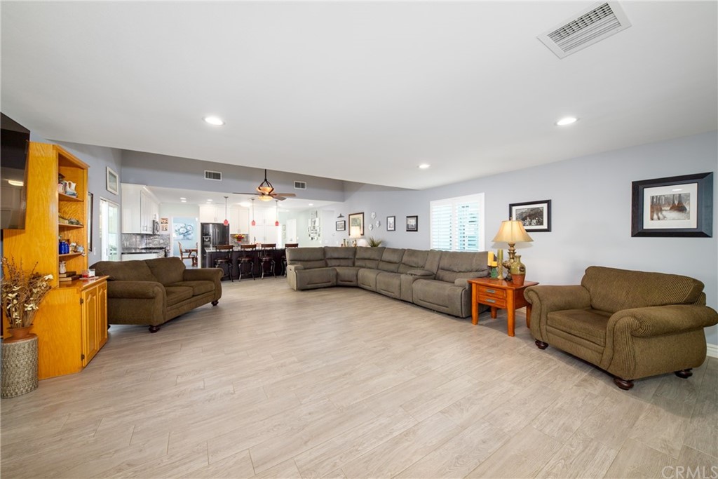 1817 Balboa Way Upland, CA 91784 - Photo 20 of 55 a living room with furniture and a couch