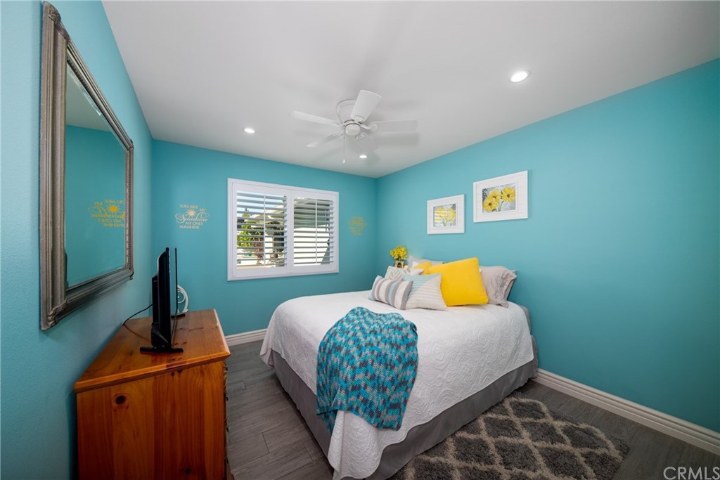 1817 Balboa Way Upland, CA 91784 - Photo 24 of 55 a bedroom with a bed and wooden floor