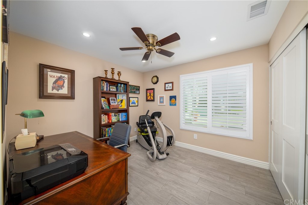 1817 Balboa Way Upland, CA 91784 - Photo 25 of 55 a living room with furniture a window and a flat screen tv