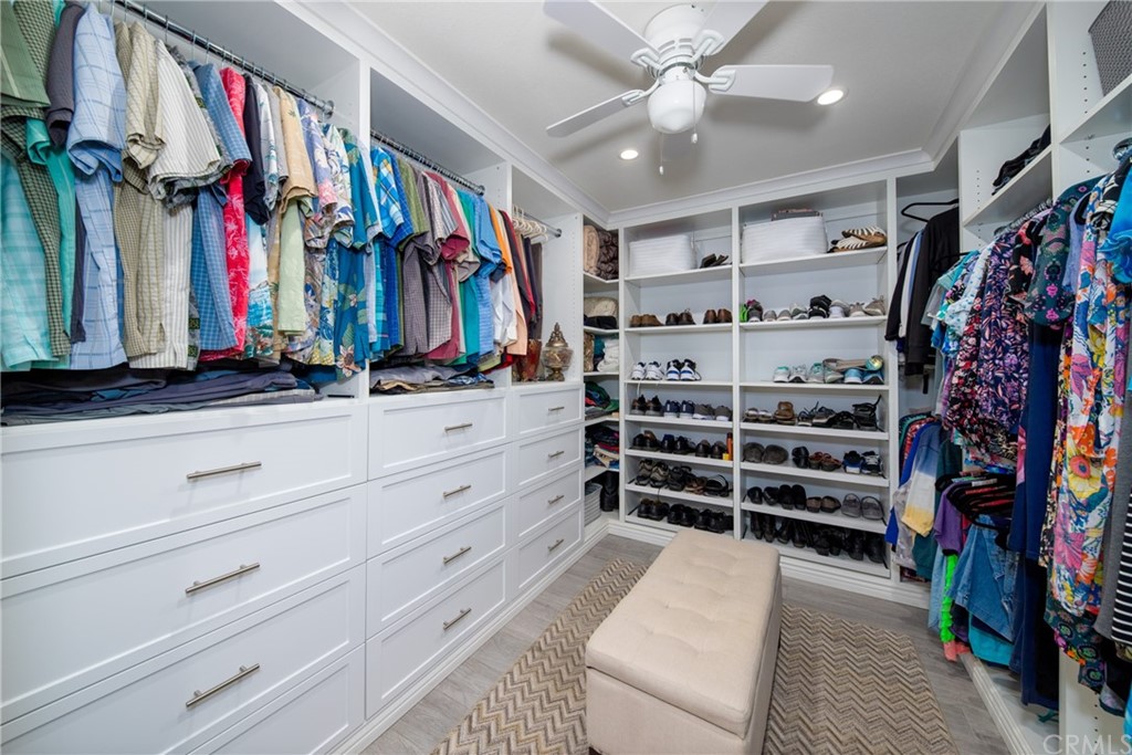 1817 Balboa Way Upland, CA 91784 - Photo 28 of 55 a view of walk in closet with clothes and shoes