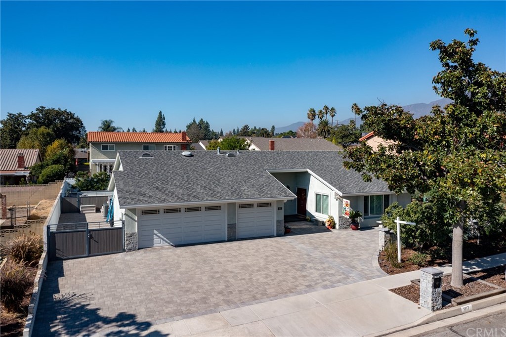 1817 Balboa Way Upland, CA 91784 - Photo 4 of 55 a view of a house with a swimming pool