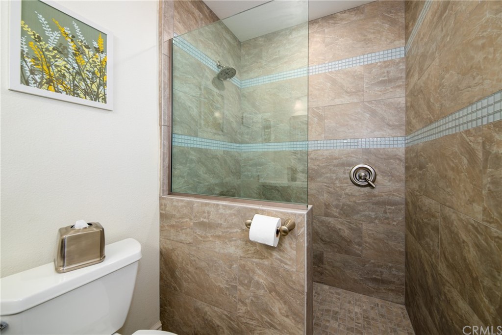 1817 Balboa Way Upland, CA 91784 - Photo 33 of 55 a bathroom with a toilet and a shower