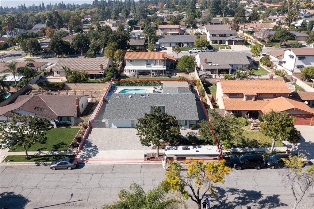 1817 Balboa Way Upland, CA 91784 - Photo 39 of 55 an aerial view of a house with a garden and lake view