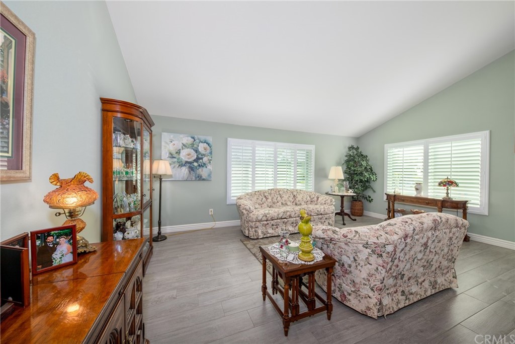 1817 Balboa Way Upland, CA 91784 - Photo 6 of 55 a living room with furniture and a wooden floor