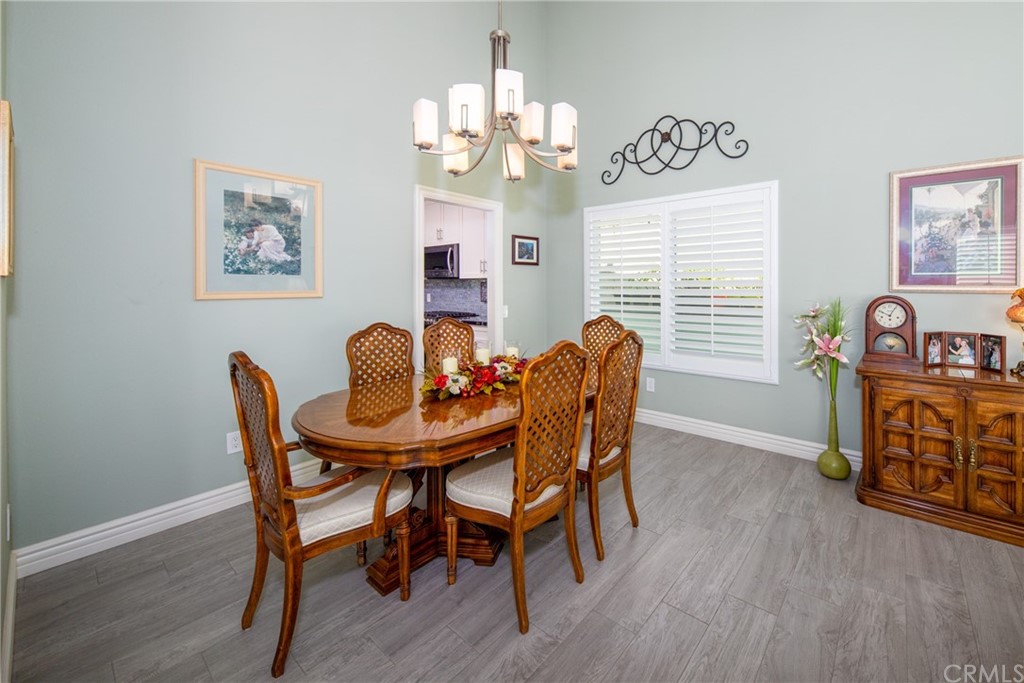 1817 Balboa Way Upland, CA 91784 - Photo 10 of 55 a view of a dining room with furniture window and wooden floor