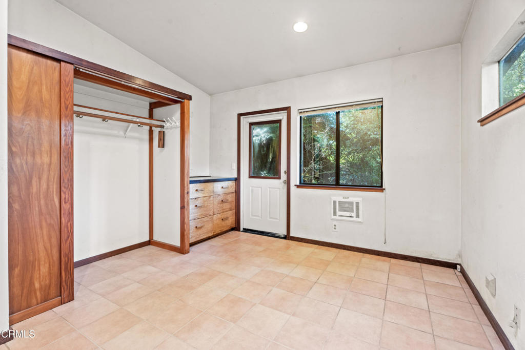 30651 Sherwood Road Fort Bragg, CA 95437 - Photo 12 of 27 a view of an empty room with a window