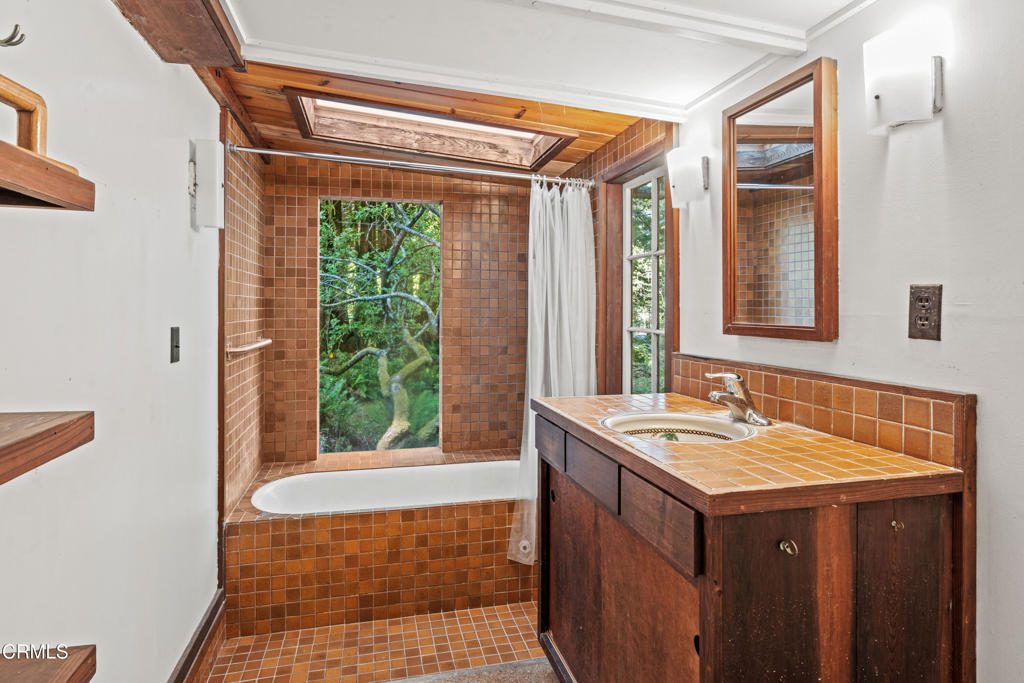 30651 Sherwood Road Fort Bragg, CA 95437 - Photo 21 of 27 a bathroom with a sink and a window