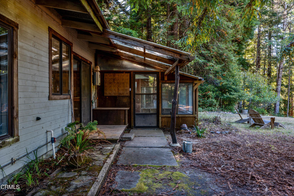 30651 Sherwood Road Fort Bragg, CA 95437 - Photo 26 of 27 a front view of a house with garden
