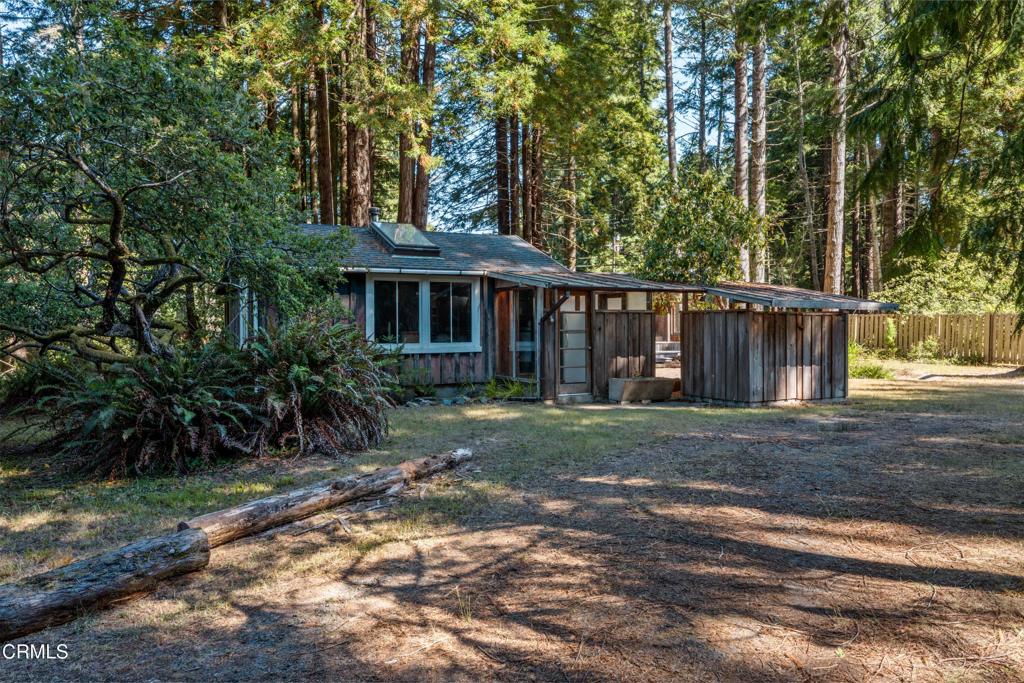 30651 Sherwood Road Fort Bragg, CA 95437 - Photo 4 of 27 a view of a house with a yard