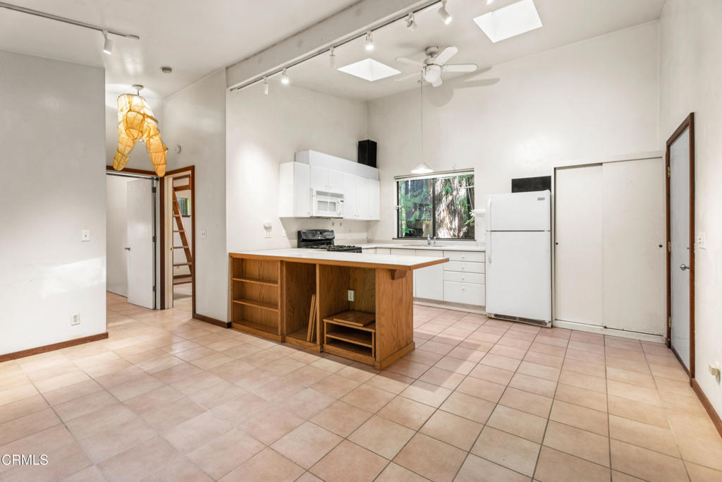 30651 Sherwood Road Fort Bragg, CA 95437 - Photo 9 of 27 a view of kitchen with a sink and a refrigerator