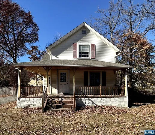 a front view of a house with patio