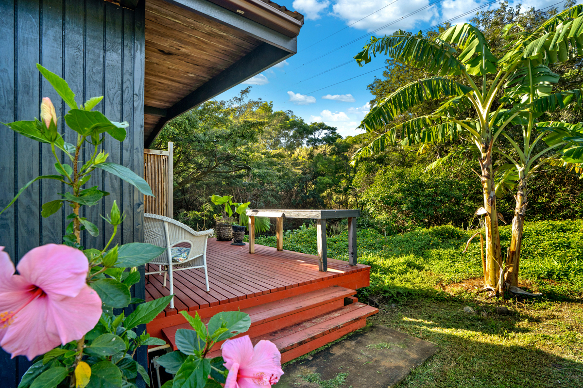 4650 Uha Road Lawai, HI 96765 - Photo 13 of 17 a view of backyard with plants and outdoor seating