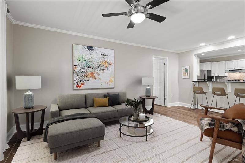 3655 Habersham Road Northeast, Unit A108 Atlanta, GA 30305 - Photo 2 of 30 a living room with furniture
