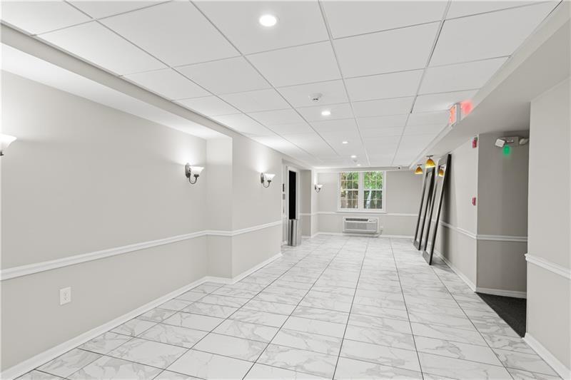 3655 Habersham Road Northeast, Unit A108 Atlanta, GA 30305 - Photo 26 of 30 a view of livingroom with furniture