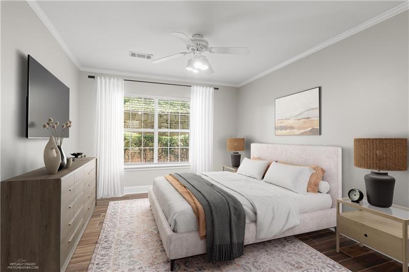 3655 Habersham Road Northeast, Unit A108 Atlanta, GA 30305 - Photo 6 of 30 a bedroom with a bed a mirror and a window