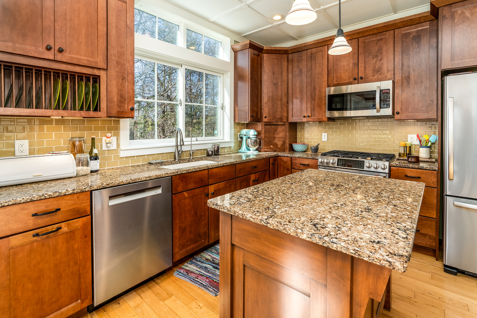 526 Shiloh Road Cobden, IL 62920 - Photo 13 of 59 a kitchen with stainless steel appliances granite countertop a sink stove microwave and refrigerator