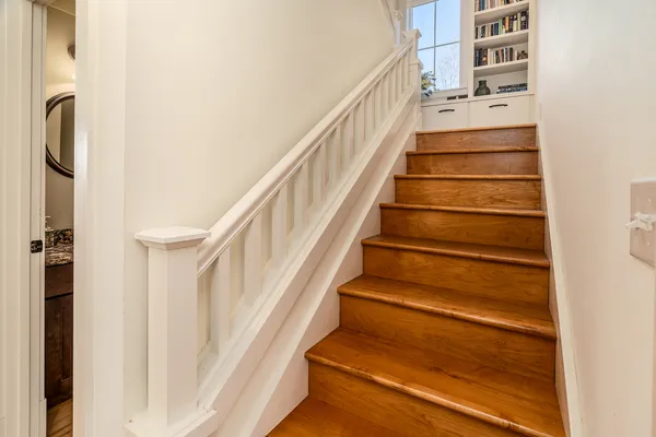 a bedroom with a bed and couch