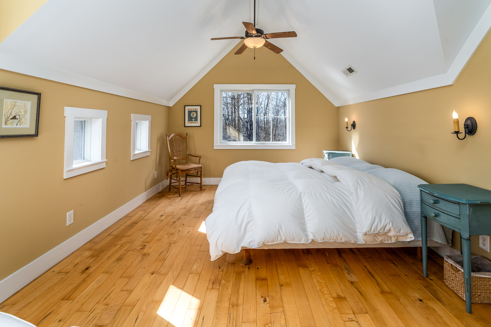 526 Shiloh Road Cobden, IL 62920 - Photo 28 of 59 a spacious bedroom with a bed a dresser and wooden floor