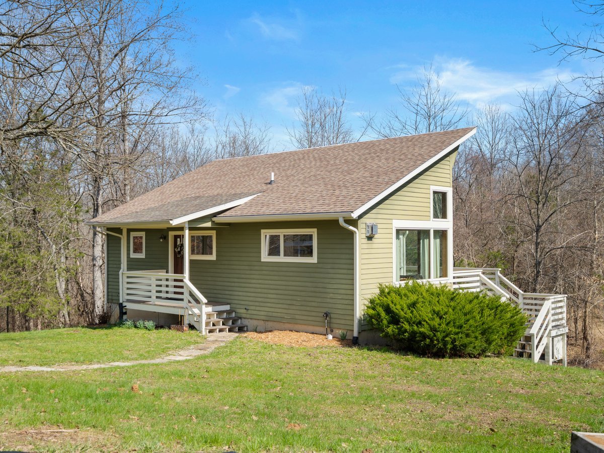 526 Shiloh Road Cobden, IL 62920 - Photo 35 of 59 a backyard of a house with dishwasher and wooden fence