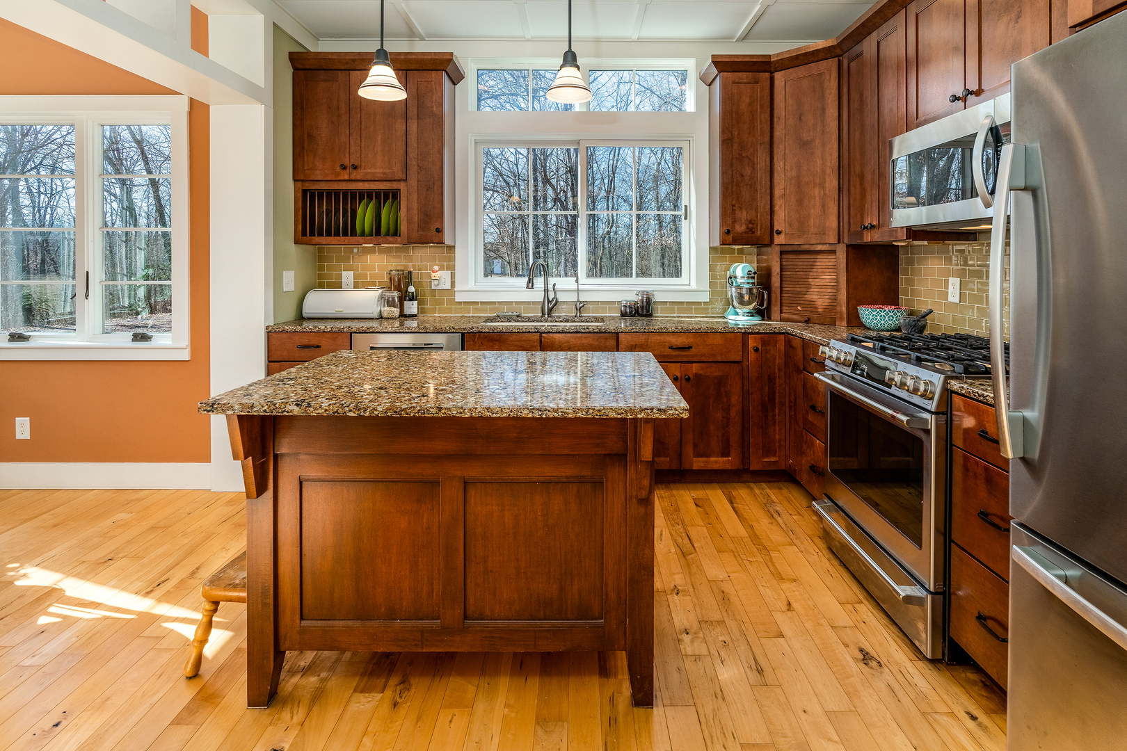 526 Shiloh Road Cobden, IL 62920 - Photo 9 of 59 a kitchen with stainless steel appliances granite countertop wooden floors and sink