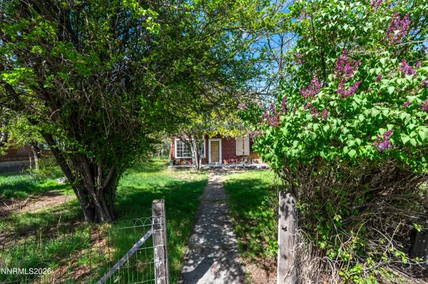 a view of backyard with green space