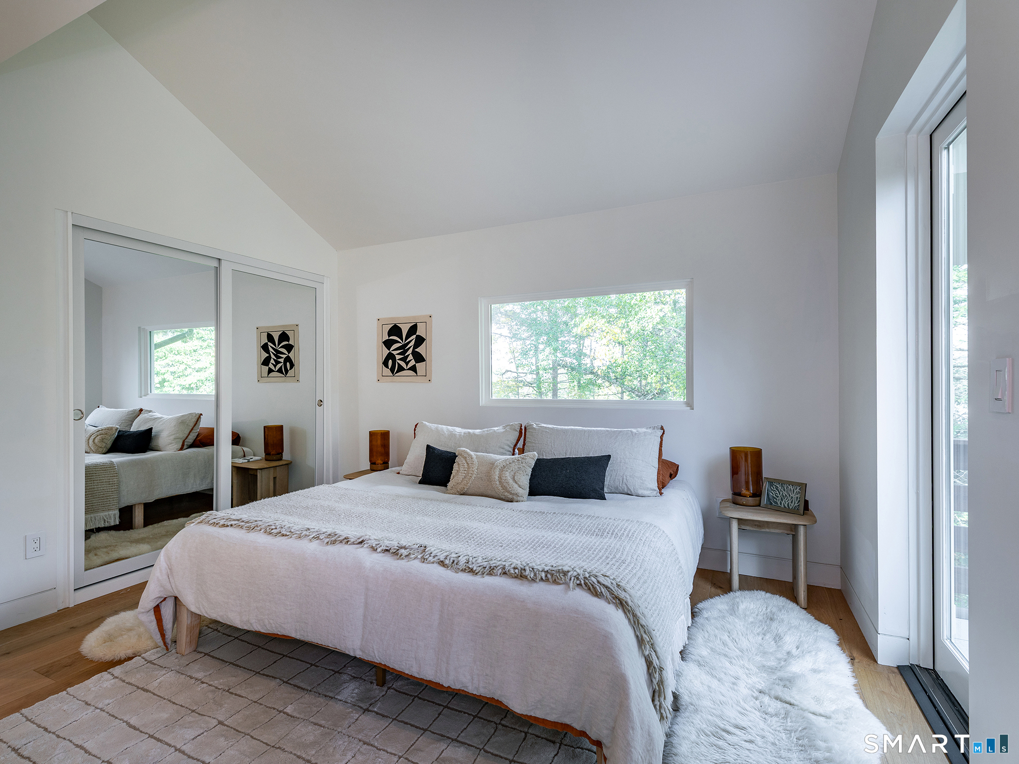 110 Sharon Road Salisbury, CT 06039 - Photo 12 of 17 a bedroom with a large bed and a window