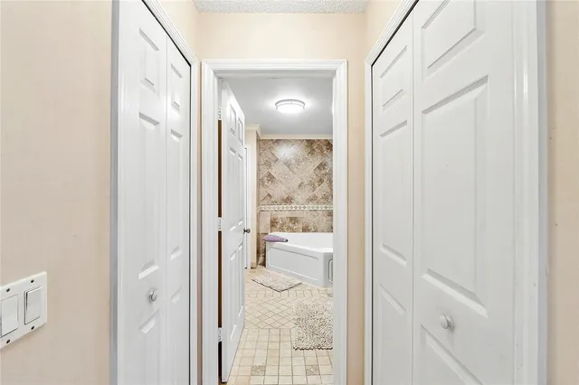 a view of a bathroom from a hallway