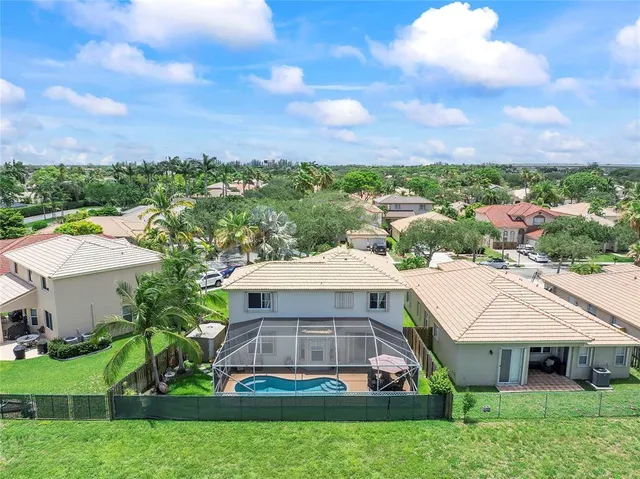 a aerial view of a house with a garden