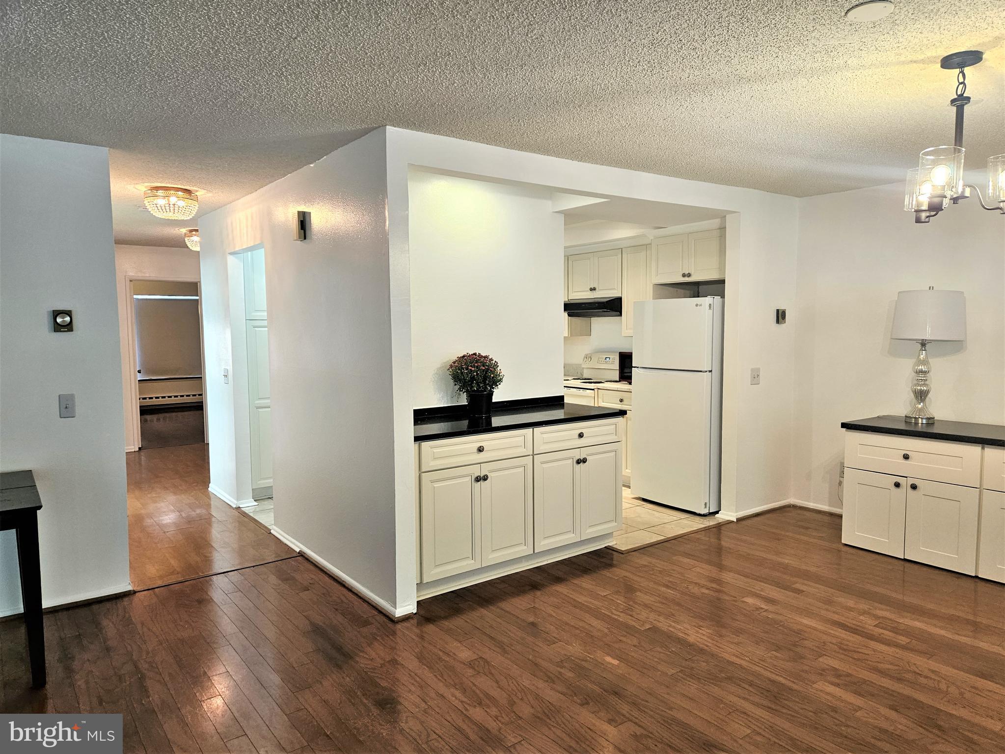 3501 Forest Edge Drive, Unit 141E Silver Spring, MD 20906 - Photo 1 of 27 Dining Room Kitchen Serving Area