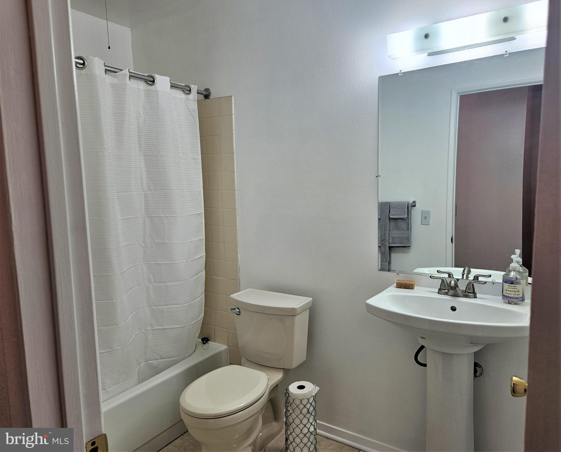 3501 Forest Edge Drive, Unit 141E Silver Spring, MD 20906 - Photo 19 of 27 Guest Bathroom w/Tub Shower