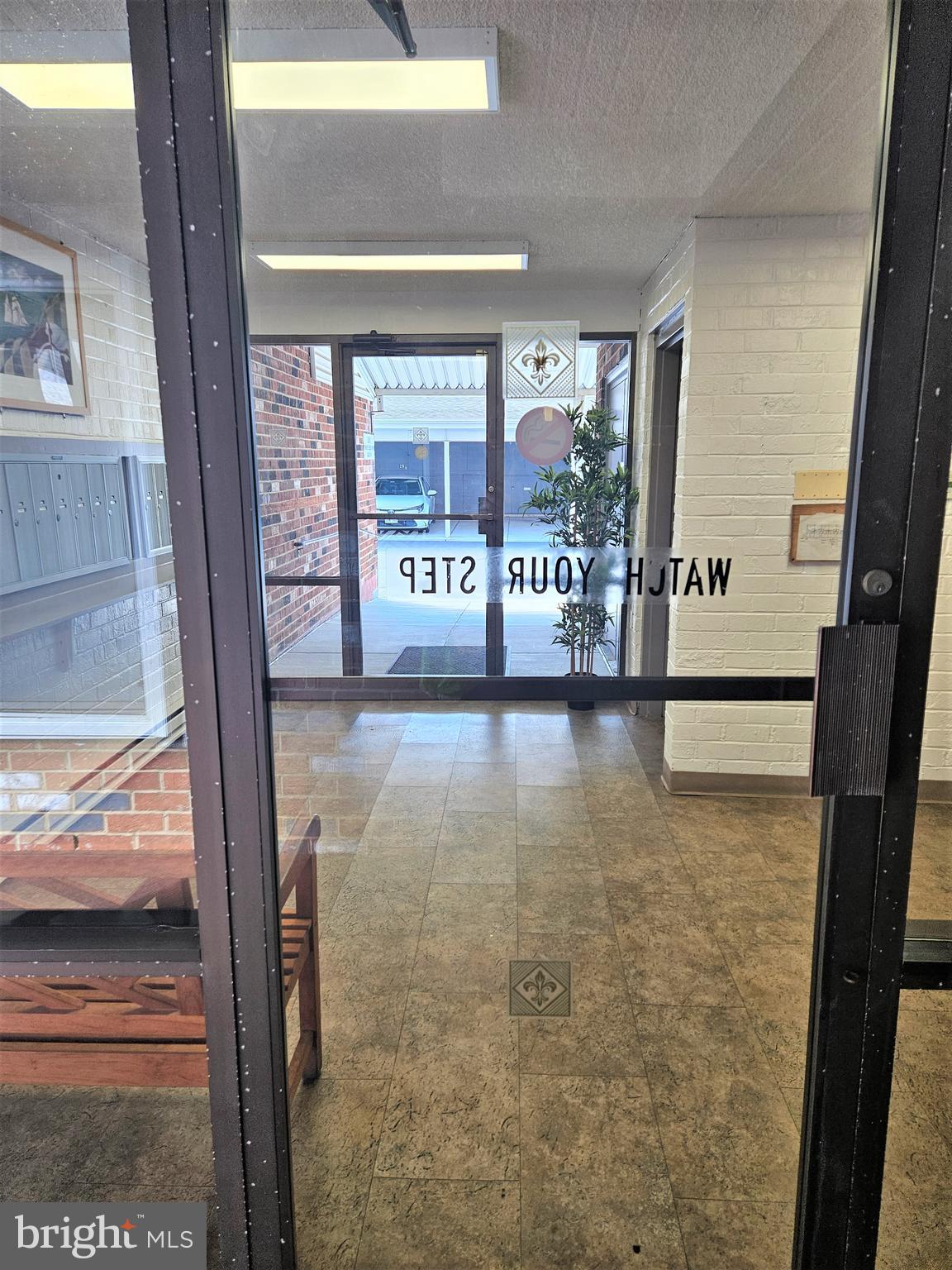3501 Forest Edge Drive, Unit 141E Silver Spring, MD 20906 - Photo 27 of 27 Lobby Entrance from Carport
