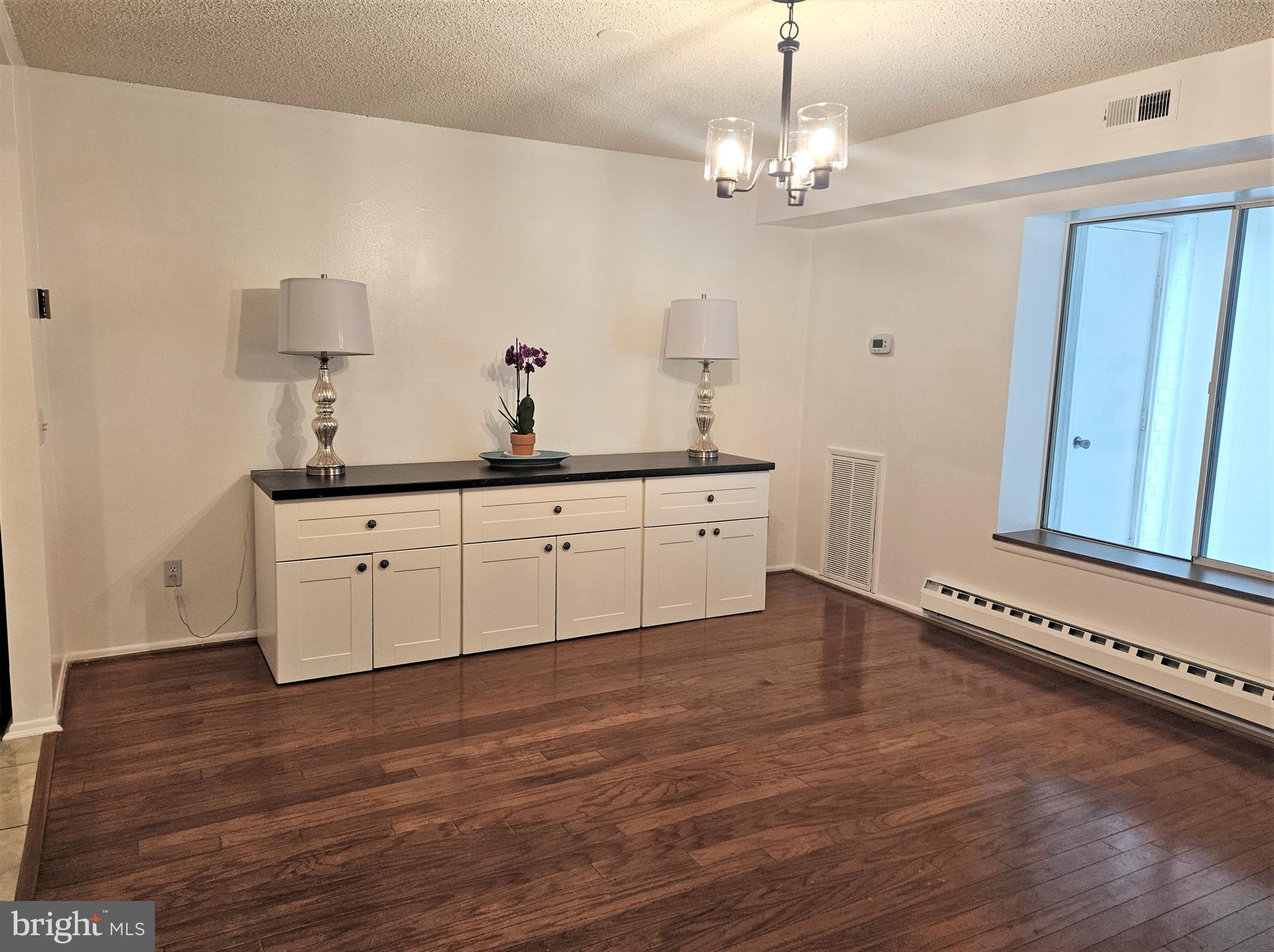 3501 Forest Edge Drive, Unit 141E Silver Spring, MD 20906 - Photo 3 of 27 Dining Room with window