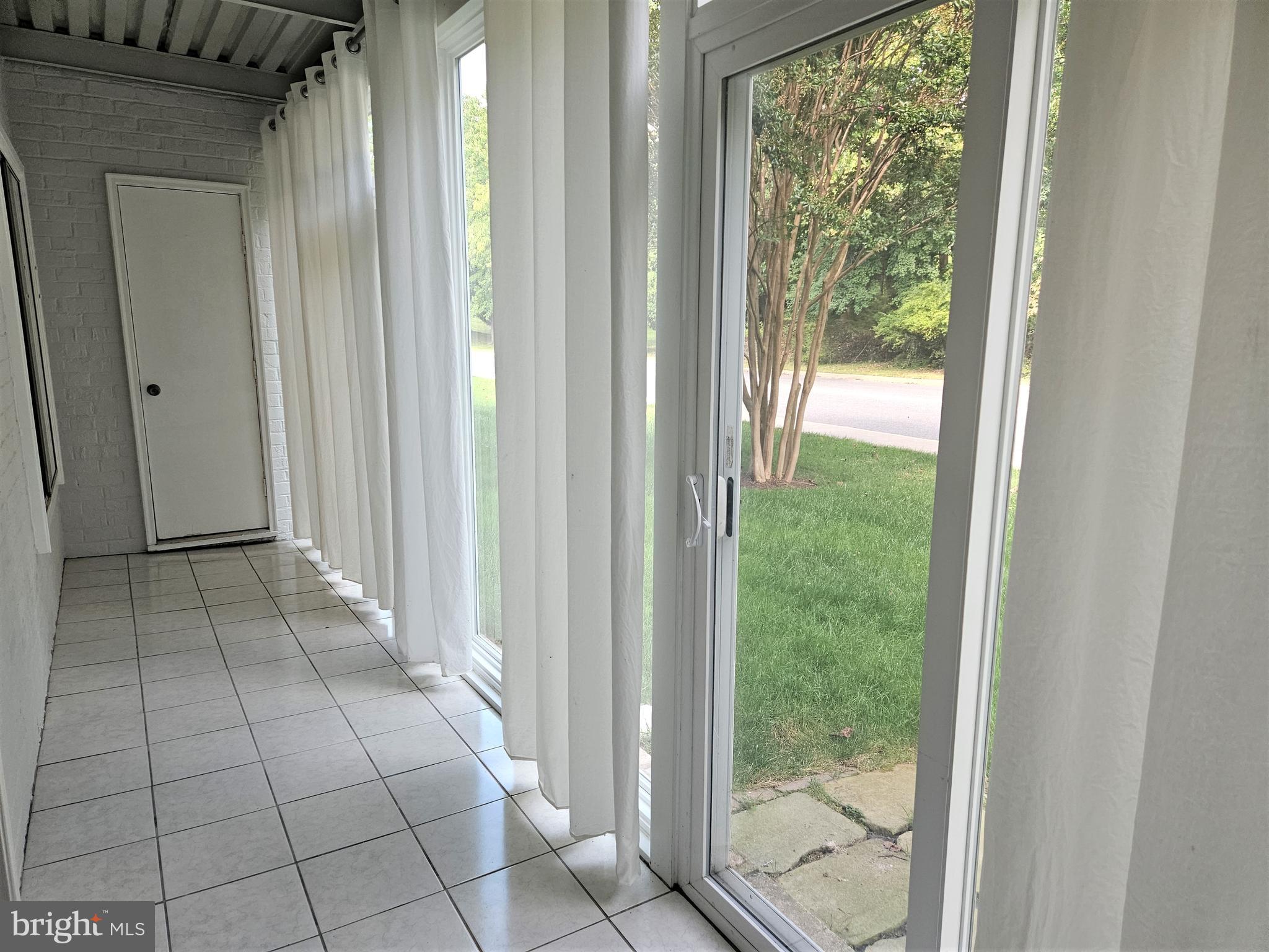 3501 Forest Edge Drive, Unit 141E Silver Spring, MD 20906 - Photo 5 of 27 Sliding Glass Doors of Patio