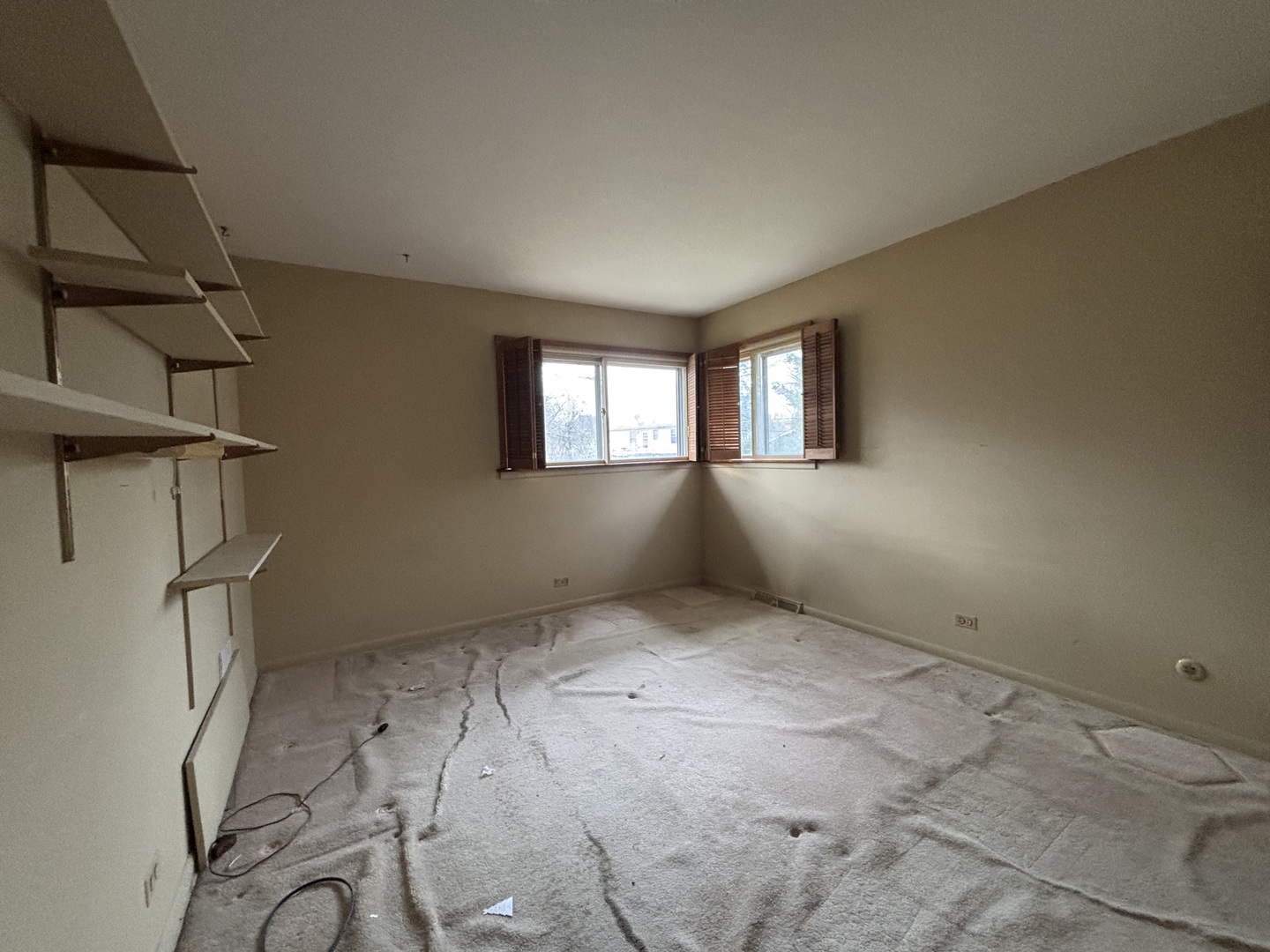 1305 West Mulberry Lane Arlington Heights, IL 60005 - Photo 8 of 14 an empty room with windows