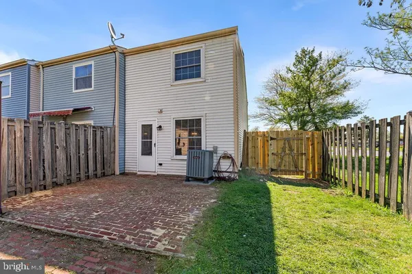 a view of a house with a yard and plants