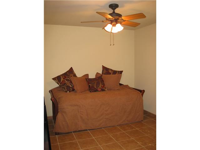 534 Gardendale Road Encinitas, CA 92024 - Photo 16 of 25 Lovely spacious bedroom with wood blinds, wooden closet doors and ceiling fan