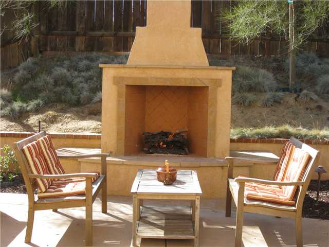 534 Gardendale Road Encinitas, CA 92024 - Photo 18 of 25 Welcome to this amazing backyard! Custom gas fireplace, eco tolerant landscaping, french drains, raised planter beds, low voltage lighting, outdoor kitchen and so much more.